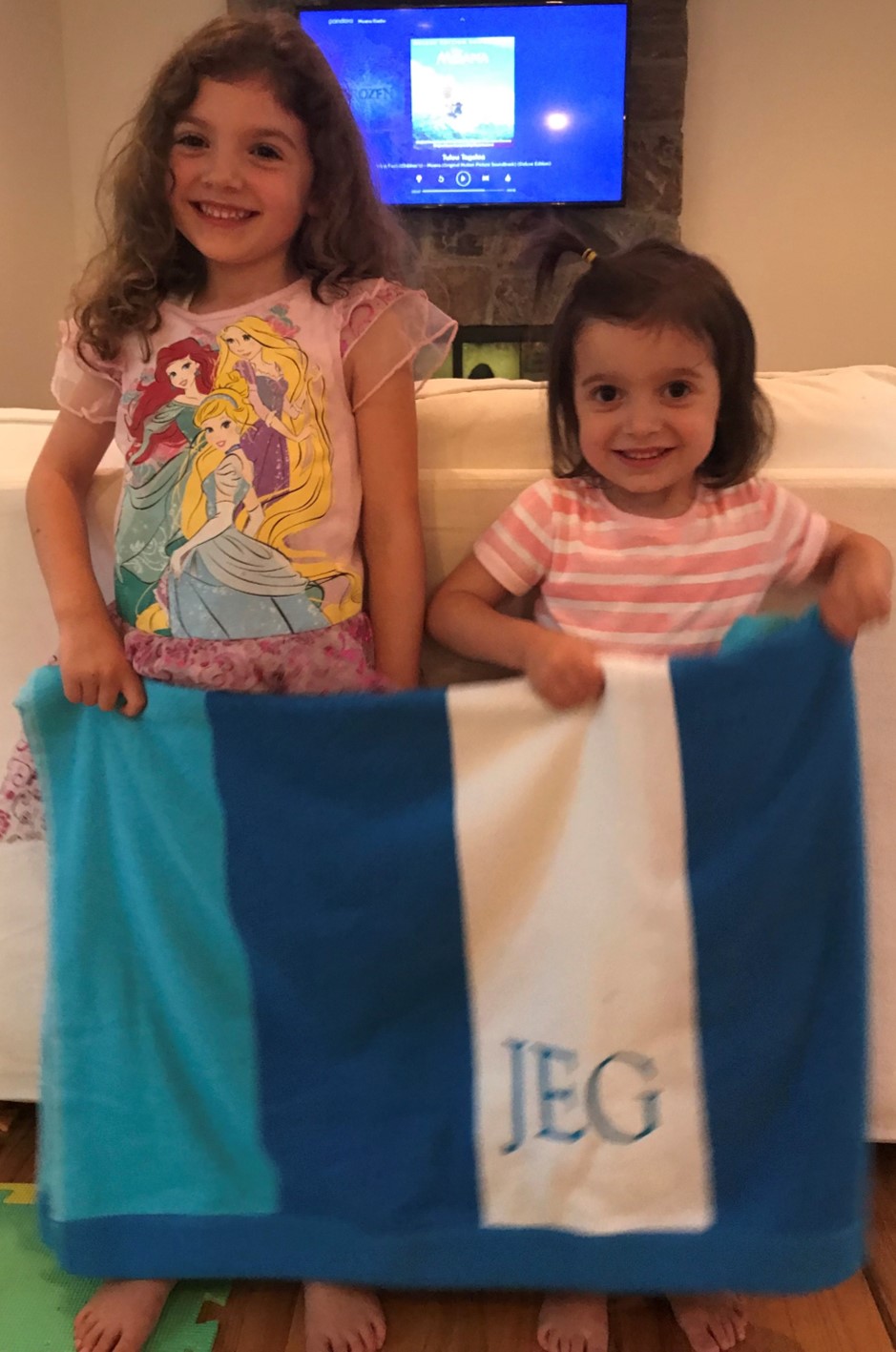 Cute kids with JEG Search towel